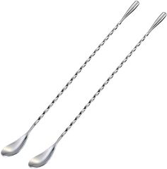 two metal spoons and fork on a white background