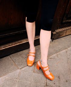 Orange Leather Open Heel Mary Jane with 6.5 cm heels - Timeless and Stylish We believe femininity and comfort can coexist in shoes.We believe in creating items that elevate your wardrobe not just add onto it. Made from premium  leather with 2 adjustable buckle. It's perfect for summer days, for early autumn. The sleek design includes a comfortable 6.5 cm heel, ensuring all-day comfort without sacrificing style. Soft and effortlessly chic, these Mary Janes transition seamlessly from casual to spe Retro Leather Mary Janes For Spring, Retro Leather Mary Janes For Fall, Vintage Leather Mary Janes For Fall, Orange Mary Janes, Spring Non-slip Mary Janes, Patent Leather Mary Jane Shoes, Shoes Everyday, Shoes Mary Janes, Leather Mary Jane Shoes