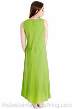 "Stunning vintage 1960s Vuokko Nurmesniemi design maxi and matching unbelievable cape in 100% lightweight cotton. The color, lime green, is so unusual in a style such as this. The dress is a simple column dress, sleeveless, darted, no waistband, unlined, with a zipper back. The cape is a complete circle, extremely full, unlined. Mod! Perfect clean condition. Marked Size: 38 Bust: 36\" Waist: 35\" Hips: 37 Shoulders: 12\" Total Length: 54.5\" Length (shoulder to waist): 16\" Length (waist to hem) Green Cotton A-line Maxi Dress, Green A-line Cotton Maxi Dress, Vintage Green Cotton Maxi Dress, Green Vintage Cotton Maxi Dress, Tea Gown, Pink Sheath Dress, Green Maxi Dress, Tent Dress, Column Dress