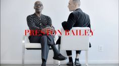 two men sitting in chairs facing each other with the words press on ballet above them