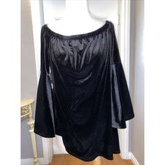 Elevate Your Wardrobe With This Stunning Ny Collection Blouse Top In Timeless Black Velvet. The Boat Neckline And Bell Sleeves Add A Touch Of Sophistication, Making It Perfect For Any Occasion Whether It's A Casual Day Out, A Workwear Essential Or Even For A Wedding Or Party. The Blouse Is Made Of 94% Polyester And 6% Spandex, Ensuring Comfort And Durability. This Tunic-Style Blouse Fits Regular And Is Machine Washable For Easy Care. It Comes In Size L, With A Pullover Closure And Is Made In Ind Gothic Blouse For Evening In Fall, Black Bell Sleeve Blouse For Party, Black Bell Sleeve Party Blouse, Blouse Fits, Workwear Essentials, Tunic Style, Style Blouse, Tunic Styles, Boat Neckline