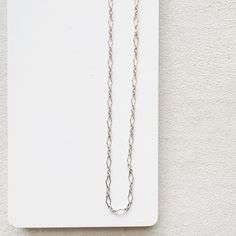 A customer favorite! You will instantly fall in love with the Halo Necklace. The beautiful pattern stands out from all of the other chains. It has a feminine, airy feel. Whether you layer it with other necklaces, let it shine on its own, or add a gemstone or pearl Bijou Charm, The Halo elevates any look. - 16-18 inches & super versatile. 18 inches is a true classic length or wear it closer to 16 inches for a shorter style, sitting closer to the base of the neck. - all pieces are 14K Gold filled Everyday Silver Double Strand Chain Necklace, Silver Double Strand Chain Necklace For Everyday, Everyday Long Silver Chain Necklace, Silver Double Strand Delicate Chain Necklace, White Gold Necklace With Figaro Chain Link, Silver Figaro Chain Necklace For Layering, Elegant Figaro Chain Link Charm Necklace, Sterling Silver Double Strand Adjustable Necklace, Elegant Figaro Chain Link Charm Necklaces