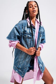 Express your sense of style in using this short-sleeved, longline distressed denim jacket as a layering piece. With an urban vibe, this oversized jacket boasts of a wide-collar neckline, a boyfriend fit, seam details, chest pockets, a button placket, frayed ends, and fabric made from rigid non-stretch 100% Cotton denim.  In our photos, we layer this jacket over our Cotton Oversized Shirt in Pink.   The model is 5’8” with measurements of 32-24-38 and is wearing a size small.  The XS-S-M-L-XL sizi Denim Shirt Street Style, Short Sleeve Denim Jacket, Boyfriend Jean Jacket, Light Blue Jean Jacket, Urban Jeans, Boyfriend Denim Jacket, Lightweight Denim Jacket, Light Wash Denim Jacket, Jean Jacket Outfits