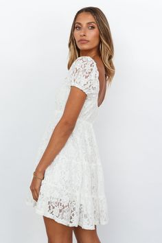 Length from shoulder to hem of size S: 74cm. White lace mini dress. Lined. Cold hand wash only. Model is a standard XS and is wearing size XS. True to size. Lightweight, non-stretchy woven fabric. Elasticated, stretchy, bust. No zipper. Slip-on style. Print placement may vary. Polyester. Dance in hail, rain, or shine in the Dancing In The Rain Dress! With features to die for, this mini has a tiered skirt that twirls in the wind and an option to wear it on and off the shoulder - depending on the Rain Dance, Rain Dress, White Lace Mini Dress, Rain Or Shine, Dancing In The Rain, Print Placement, Lace Mini Dress, Tiered Skirt, In The Rain