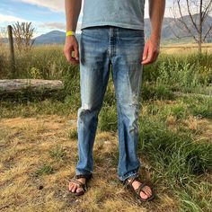 "Perfectly worn in Lee jeans with just the right amount of distressing at the knees. Some discoloration on the front, as shown. It's not every day that you come across a pair of jeans quite like these. Model is 6'4 and normally wears a 34 length. Measurements: 35\" waist 13\" rise 33\" inseam" Rugged Distressed Faded Jeans, Rugged Ripped Medium Wash Jeans, Rugged Ripped Faded Jeans, Rugged Distressed Straight Leg Jeans, Rugged Faded Ripped Jeans, Rugged Distressed Medium Wash Jeans, Rugged Ripped Straight Leg Bottoms, Rugged Distressed Straight Leg Bottoms, Rugged Medium Wash Distressed Bottoms