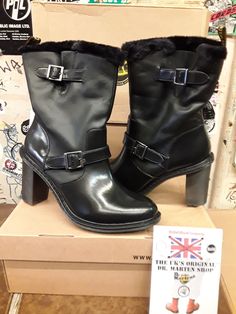 These heeled boots by Dr Martens will give you a great look with comfort too boot. They have been made with a black nappa leather which is very comfortable when you are wearing them. They have a nice sturdy heel and have two side buckles. They also have a black fleece fur lining. Can be worn casually or on that night out. We have SIZES 3/36, 4/37, 5/38 and 8/42 available Winter Leather Heeled Boots With Reinforced Heel, Leather Heeled Boots With Reinforced Heel For Winter, Winter Ankle-high Heeled Boots With Leather Lining, Winter Padded Heel Closed Toe Boots, Winter Boots With Padded Heel And Closed Toe, Winter Padded Heel Ankle Boots, Padded Heel Ankle Boots For Winter, Winter High Ankle Heeled Boots With Leather Lining, High Heel Boots With Leather Lining For Winter