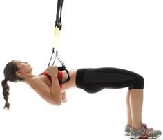 a woman doing aerial exercises on a white background