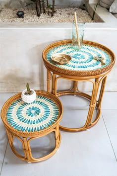 two wicker tables sitting next to each other on top of a white tile floor