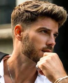 Top 50 Trendy & Cool Men's Fade Haircuts: Detailed Gallery | 50 Best Fade Haircuts for Men (Detailed Gallery) | Aesthetic Hairstyles For Men Mens With Beards, Faded Hairstyles For Men, Men Hairstyle For Curly Hair, Mens Hair Styles Medium, Fade Hair Styles For Men, Mid Fade Haircut Wavy Hair, Short Wavy Haircuts Men Fade, Low Mid Fade Haircut Men, Mid Fade Long Hair