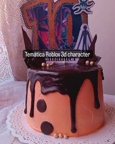 a birthday cake with chocolate icing and decorations