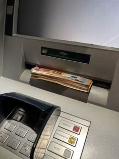 an atm machine with some money in it