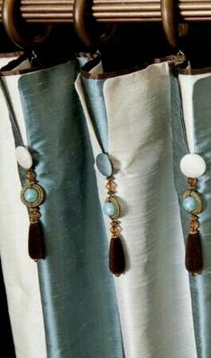 curtains with tassels and beads hanging from them