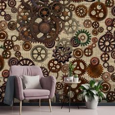 a chair and table in front of a wall with gears on the wall behind it