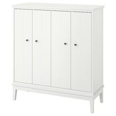 a white cabinet with three doors and two drawers