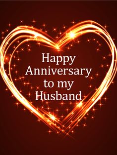 a happy anniversary to my husband with sparkles in the shape of a heart on a red background