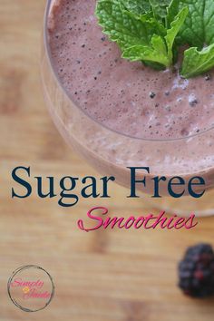 a smoothie is garnished with fresh mint and has the words sugar free smoothies on it