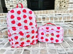 These bags are so much fun and full of vibrant colors!  They have a pocket on each side and a pocket on the inside!  The book bag is 11" L X 5.5" W X 16" H and the lunch box is 10" L X 3" W X 7.5" H If you have questions, please feel free to contact us! If you are out of the US we will work with you about the shipping prices. Please message us with any questions. Cute School Backpack With Pockets, Casual Standard Backpack Diaper Bag For School, Back To School Spirit Backpacks, Cute Rectangular Diaper Bag, Cute Rectangular Backpack For School Events, Fun Bags For Back To School, Casual Rectangular Bag For School Events, Fun Rectangular Student Bag, Back To School Bags With School Spirit