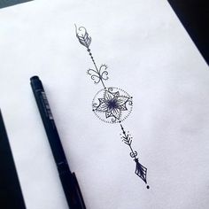 a pen and ink drawing of an arrow