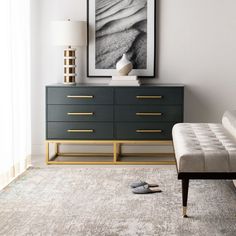 a living room scene with focus on the dresser