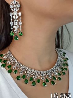 Buy Premium CZ Diamond Replica Necklace and Earring Set With Green online on Etsy India. Shop for handmade, vintage and unique Wedding Necklaces items from JEWELPLAZAA online on Etsy Diamond Necklace And Earrings Set, Diamond Necklace And Earrings, Pink Choker, American Diamond Jewellery, American Diamond Necklaces, Detailed Necklace, Diamond Jewelry Designs, Tiffany Jewelry, Indian Earrings