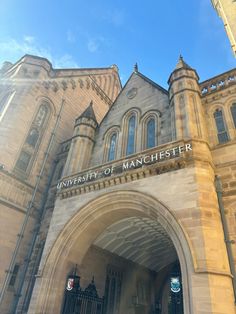 the front entrance to manchester university, england