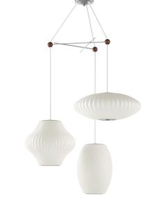 two white lamps hanging from the ceiling