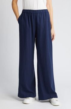 Cut from a breezy linen blend with a high waist and wide legs, these pull-on pants are a cool remake of a closet classic. 30" regular inseam; 25" leg opening; 11 12" front rise; 16" back rise (size Medium) 28" petite inseam; 24" leg opening; 11" front rise; 15" back rise (size Medium P) Elastic waist Front slant pockets; faux back welt pocket 55% linen, 45% rayon Machine wash, tumble dry Imported Women's Clothing Relaxed Fit Wide Leg Pull-on Pants, Relaxed Fit Wide Leg Pull-on Bottoms, Solid Cotton Wide Leg Pull-on Pants, Wide-leg Pull-on Rayon Pants, Wide Leg Rayon Pull-on Pants, Linen Blend Pants, Denim Maxi Skirt, Navy Blazer, Pull On Pants