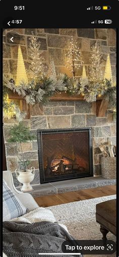 the fireplace is decorated for christmas with pine cones and garlands on each mantel