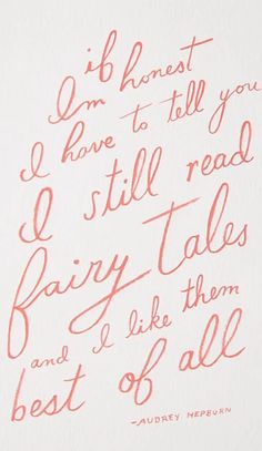 the words are written in red ink on white paper, and it says i am honest to tell you i still read fairy tales and i like them best of all