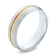 two tone gold and silver wedding ring with an edge inlayed to the side