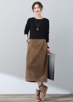 "FEATURES * Corduroy, 60% Cotton * Medium Weight, Comfortable, Breathable * Elastic waist * Three pockets * Below knee length * High waist corduroy skirt * Casual corduroy skirt * Perfect for winter, autumn * Wash only in cold water and do not expose to direct sunlight * Size XS-Sample is ready to ship, Only 1 available, don't accept refund, exchange ★★ The model's height approx 170 cm (5′ 7″) with the 84 cm (33\") bust, 66 cm (26\") waist. She is wearing in the size XS. ★★ Get your size in Size Corduroy Wrap Skirt, Cord Skirts, Plus Size Corduroy, Corduroy Skirt Outfit, Brown Corduroy Skirt, Warm Skirts, Maxi Pencil Skirt, Cord Skirt, Coffee Sweater