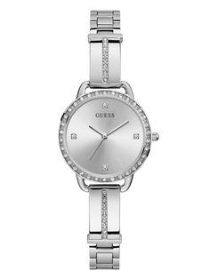 Effortless meets elegant in this pristine silver-tone timepiece featuring an unmarked face with analog movement and surrounding crystal embellishments on the case. Finished by a sleek polished link bracelet. Case diameter in mm: 30  Water resistant up to 30 m/100 ft  2 year limited warranty Guess Watches Women Silver, Womens Watches Silver, Watches Silver, Style Watch, Bracelet Style, Analog Watch, Bellini, Metal Bracelets, Adjustable Bracelet