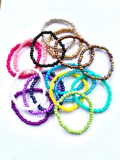 Stretch bracelets are a fun and stylish accessory for you or your little ones. Can be worn alone or stacked with other bracelets for more fun! Listing is for ONE stackable bracelet your choice of color. Message me with any custom orders if you wish to mix multiple colors in a single bracelet. Kids bracelet pairing: Pair these stacking bracelets with our adorable kids name bracelets https://www.etsy.com/listing/918899045/kids-bracelet-kids-name-bracelet Adult Bracelet pairing: Pair these stacking Everyday Cute Stretch Bracelet With Colorful Beads, Playful Beaded Stretch Bracelet, Cute Stretch Bracelet With Colorful Beads, Adjustable Playful Stretch Bracelet For Everyday, Playful Adjustable Stretch Bracelet For Everyday, Playful Adjustable Bracelets With Tiny Beads, Adjustable Fun Beaded Bracelets With Round Beads, Fun Round Beads Friendship Bracelets For Everyday, Trendy Adjustable Stretch Bracelet With Tiny Beads