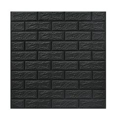 a black brick wall that is made out of concrete blocks and has no mortars on it