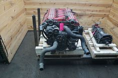 an engine is on a pallet in a storage area