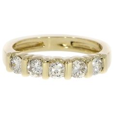 This classic and elegant design, is obtained by harmoniously setting the diamonds between gold bars creating an innovative band to celebrate your 5 year anniversary or just to wear with your existing rings. Handcrafted in 14k yellow gold with 5 round diamonds G/H color, VS/SI1 clarity, weighing approximately 0.75 carats total. Created to fit a finger size 6, but can be resized. Ring Bands, 5 Year Anniversary, Gold Bars, Wedding Anniversary Rings, Special Ring, Diamond Bar, Ring Ideas, Diamonds And Gold, Shiny Things