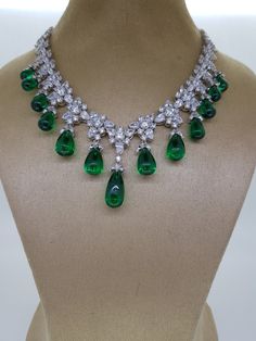 Luxury Hand Set Emerald Necklaces, Luxury Hand-set Emerald Necklaces, Formal Hand Set Emerald Necklaces, Formal Hand Set Emerald Necklace, Luxury Emerald Stone Necklaces, Hand Set Emerald Necklaces For Formal Occasions, Formal Hand-set Emerald Necklaces, Luxury Emerald Necklace With Stones, Luxury Diamond Bridal Necklace With Stones