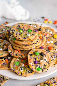 halloween sprinkle cookies on a white plate