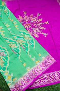 Get ready to wear this stunning Banarasi silk saree. Woven with passion and excellence, this Handloom Banarasi silk saree won't fail to catch attention. Tussar Georgette silk sarees are known for their longevity and resilience, they make you fall in love with them. Color -Green & Purple with hand brush Weave -Cutwork Blouse- Plain with zari border Click here to view underskirt Pista Green Banarasi Silk Blouse With Zari Weaving, Pista Green Silk Saree With Zari Work, Pista Green Banarasi Silk Pre-draped Saree For Eid, Pista Green Paithani Silk Saree, Pista Green Silk Saree For Festivals, Pista Green Silk Blouse Piece With Zari Weaving, Pista Green Banarasi Silk Saree With Zari Weaving, Semi-stitched Art Silk Pashmina Shawl With Self Design, Pista Green Katan Silk Saree With Zari Work