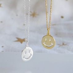 Cute smiley face charm necklace.  Spread a little happiness as you can't help but smile when you see this happy smiling face charm! Maybe you'll wear this necklace as a reminder to smile and have fun, as a smile can be powerful and contagious and spread joy and happiness a long way.  This smiley face necklace also makes a great gift for a loved one or friend and there are a range of inspirational message cards that can be included with the necklace, such as: When you're smiling the whole world smiles with you I can't help but smile when I think of you Smile big laugh often Don't forget to smile today And if you have your own smile quote, drop me a message and I will create a personalised card for you.  This gorgeous and fun smiley face necklace is available in Sterling Silver or Sterling S Smiley Face Round Jewelry For Friendship, Minimalist Smiley Face Jewelry For Everyday, Round Smiley Face Jewelry For Friendship, Playful Smiley Face Jewelry For Everyday, Playful Smiley Face Jewelry For Gifts, Cheerful Smiley Face Jewelry For Everyday, Cheerful Smiley Face Jewelry As Gift, Smiling Emoji, Smiley Face Necklace