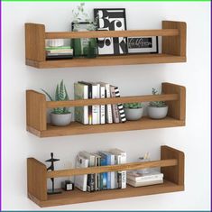 two wooden shelves filled with books and plants