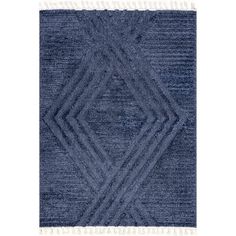 a blue and white rug with fringes