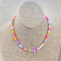 This necklace is made with glass crystal beads which are dyed different neon colors. The beads are 6mm faceted rondelle beads. Each bead is hand knotted with hot pink 100% nylon cord. The hand knotting in between each beads takes time to do but looks gorgeous making the necklace also very easy to wear. The necklace is finished off with a gold plated stainless steel chain, clasp and logo charm. The necklace  is 17inches with 2 inch extension so it can be worn at different lengths. Please keep in mind that because the beads are mixed colors, each necklace will look differently and have a different color combos. The beads are strung at random with no color pattern.  The necklace is also available in different colors. Ewelina Pas Jewelry Mac Collection, Lavender Brown, Crystal Bead Necklace, Ring Bag, Crystal Chain, Neon Colors, Favorite Rings, Glass Crystal, Steel Chain