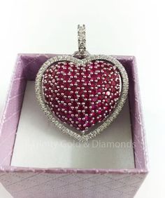 Pave Ruby And Diamond Heart Pendant Necklace, Ruby Heart Pendant, Gemstone Heart Pendant, Birthstone Heart Pendant, Big ruby Heart Pendant Main stone : Ruby Gemstone Creation : Lab Created Diamonds *Secondary Stones: Moissanite Diamond (MOISSANITE PASSES DIAMOND Tester Metal Purity: 925 parts per 1000 Cut: Very Good Metal: Sterling Silver ** PRODUCT CARE ** >> Keep your jewels safe in our box. >> When storing jewelry make sure it doesn't rub against other jewelry >> Though our jewelry doesn't turn black it is recommended to keep it away from water chemicals, soap, etc. ** SHIPPING ** We ship all time via standard post, It takes around3-5 working days to deliver an item. M O R E ∙ F R O M ∙ U S https://www.etsy.com/in-en/shop/trinitygolddiamonds?ref=seller-platform-mcnav Customization is al Heart-shaped Cubic Zirconia Jewelry For Valentine's Day, Heart-shaped Gemstone Heart Necklace For Weddings, Heart-shaped Gemstone Necklace For Wedding, Cubic Zirconia Heart Necklace With Gemstone For Valentine's Day, Heart Necklace With Cubic Zirconia For Valentine's Day, Valentine's Day Heart Necklace With Cubic Zirconia Gemstone, Cubic Zirconia Heart Pendant Jewelry With Heart Beads, Cubic Zirconia Heart Necklace With Gemstone, Diamond Heart Necklace With Gemstone