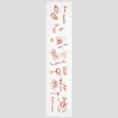 a red and white bookmark with drawings on it