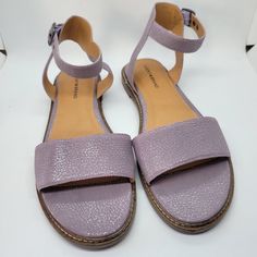 Lucky Brand Kimaya Flat Sandals Women's Shimmer Lilac Purple Size: 8.5m Round Toe Adjustable Ankle Buckle Strap 0.5" Heel Leather Upper Rubber Sole ***Brand New Without The Box - Never Used*** Please Message Me With Any Questions You May Have. Thank You For Looking! Purple Leather Sandals With Buckle Closure, Casual Purple Slip-on Sandals, Purple Non-slip Slip-on Sandals, Purple Sandals With 4-inch Heel And Ankle Strap, Purple Leather Slip-on Sandals, Lucky Brand Shoes, Purple Leather, Lucky Brand, Flat Sandals