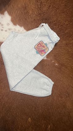 Cute sweatpants with a western flare! Do run a little bit so might size down. They are Gildan Heavy Blend! They are fleece on the inside so very cozy and warm! Country Christmas List, Comfy Country Outfits, Comfy Western Outfits, Christmas List Items, Coors Cowboy, Casual Western Outfits, Pants Western, Cute Sweatpants, Pants Comfy