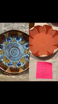 an orange and blue plate sitting on top of a table next to a pink note