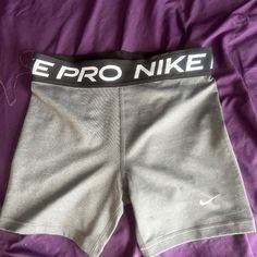 They Are Grey 5” Nike Pros, Despite The Size They Fit Very Tight. Never Worn, Only Tried On. Even Though They Are Kids They Fit Like A Woman’s Medium. Grey Nike Pros, Nike Pro Shorts, Nike Pros, Nike Shorts, Athletic Shorts, Nike Women, A Woman, Tights, Nike