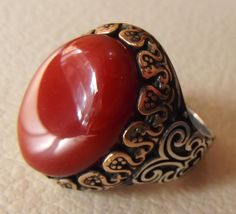 liver agate dark red carnelian aqeeq huge heavy antique sterling silver and bronze persian ring arabic turkish style all sizes jewelry عقيق Risk free Quality guarantee policy : If you are not satisfied with your item for any reason simply send it to us and you will get a replacement or refund . please write or choose your size with the order and we will size it for you . Our ring is handcrafted mostly with a few simple tools . but some methods are used in casting like lost wax method . sterling Antique Brown Carved Jewelry, Antique Brown Ring Jewelry, Antique Brown Jewelry As A Gift, Antique Brown Jewelry For Gifts, Antique Brown Jewelry For Gift, Elegant Engraved Carnelian Jewelry, Antique Bronze Gemstone Jewelry, Traditional Amber Oval Jewelry, Antique Oval Carnelian Jewelry